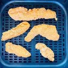 Open your bag of frozen chicken strips and shake to remove any extra loose breading. Frozen Chicken Tenders In Air Fryer Aubrey S Kitchen