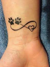 37 Cute And Meaningful Love Themed Tattoo Designs Trendy Tattoos Print Tattoos Pawprint Tattoo