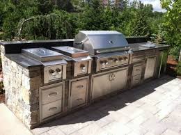 For custom frameworks, poured concrete. Modular Outdoor Kitchen Cabinet Kits Outdoor Kitchen Kits