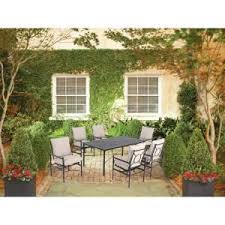Hampton Bay Barnsley 7 Piece Metal Top Patio Dining Set With Textured Silver Pebble Cushions Discontinued Fss61119mst The Home Depot Patio Patio Dining Set Patio Set