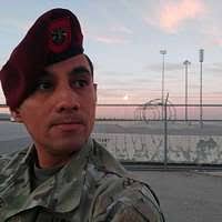 US Air Force (USAF) SENIOR AIRMAN (SRA) Nicholas Masi, 39th Security Forces  Squadron (SFS), prepares to fire his 9mm handgun