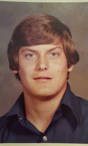 I was 15 years old and a sophomore in high school in this picture. My hair  had assumed the shape of my football helmet. Ha.