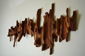 Contemporary wall sculptures, though not necessarily carved into stone, stem from this practice. Abstract Sculptures And Original Artwork From Reclaimed Wood Lutz Art Design