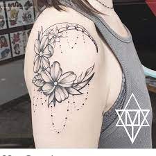 Grey Flowers And Crescent Moon Tattoo On Girl Right Shoulder Whimsical Tattoos Shoulder Tattoos For Women Flower Tattoo Shoulder