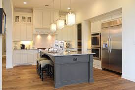 Kitchen Cabinets In Bone White With Custom Wood Vent Hood Maple Kitchen Cabinets Wood Kitchen Cabinets White Kitchen Decor