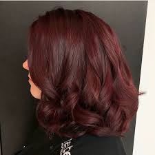 The 90s Mulled Wine Color Is Back And Now We Really Want To Dye Our Hair Dark Cherry Red Hellogiggles Wine Hair Wine Hair Color Wine Red Hair