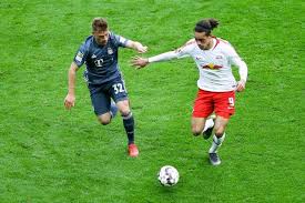 His initial shot was saved by dortmund goalkeeper marwin hitz but the rebound clipped kimmich's boot and looped in for the winning goal eight minutes from time. Yussuf Poulsen Kimmich Helped Me Learn German