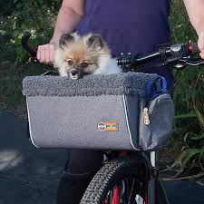 Some pet baskets for bikes are designed to sit behind your seat and fix onto the back rack, while others fit onto your bike's handlebars. K H Travel Pet Bike Basket Dog Strollers Bicycle Baskets Petsmart