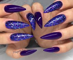 A celeb favorite, stiletto nails are still a trending nail shape. Royal Purple Purple Nails Blue Nails Fun Nails