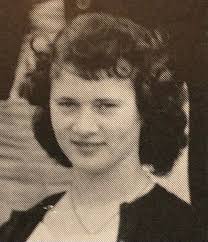 A teacher leads a class discussion about office ethics