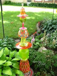 Whimsical Hand Painted Glass Garden Art By Second Glass Repurposed Glass Garden Totem Diy Art Colorful Garden Deco Glass Garden Art Garden Crafts Garden Art