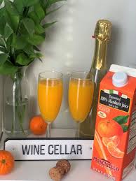 Learn how to make mimosas with this classic mimosa recipe! Mandarin Mimosa Recipe Brunch Cocktails Wine Cellar Group