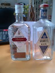 Some Old Gilbey S Gin Bottles I Found The Antique Gin Is Still Unopened Gin Bottles Gin Gilbey S Gin