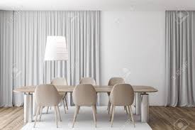 These black, sheer lace curtains could be cloying in another setting, but they provide a lovely soft touch in this otherwise modern dining room. Interior Of Modern Dining Room With White Walls Wooden Floor Stock Photo Picture And Royalty Free Image Image 121166983