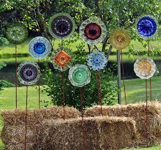 There was a guy there who sold glass garden art. Garden Design Ideas With Recycled Material