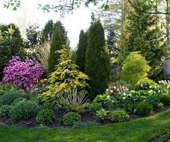 51 Smart Ideas To Make Evergreen Landscape Garden On Your Front Yard Evergreen Landscape Front Yard Low Maintenance Landscaping Front Yard Backyard Landscaping