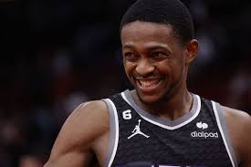 Watch: De'Aaron Fox passes it off an opponent's back to set himself up for  a massive dunk