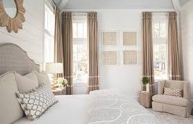 Depending on the room's direction, it may not get a lot of sunlight, so you won't want to hang dark curtains to draw even more attention to that. Beige French Pleat Curtains With White Stripes Cottage Bedroom