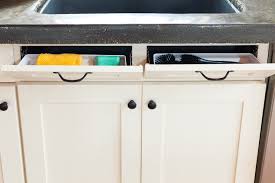 The 2 3/4 deep tray features tab stops to prevent it from tipping too far. Kitchen Sink Organization Creative Cain Cabin