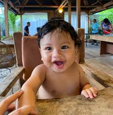 What makes a senior citizen qualify as indigent in Poblacion 1, Carcar City?