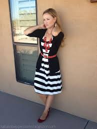 Black And White Strips Frock Zooey Deschanel Inspired Fashion Black And White Striped Dress Black Cardigan Red Belt Red Statement Necklace Red Flats Fashion Style Dresses