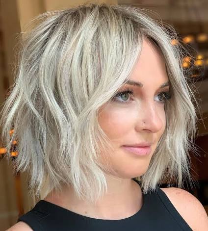 TEXTURED SHAGGY BOB Using the fringe to complete the final touches and create a soft airy bob. Using PHANTOM II 6” from @arcscissors. Thank you @sevenhaircare for the fun weekend. Now back