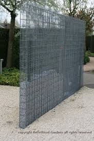 Some Innovative Ideas On Display At Appeltern Gardens Such As This Hardware Cloth Metal Mesh Gabion Like Fence Or P Fence Design Gabion Wall Landscape Design