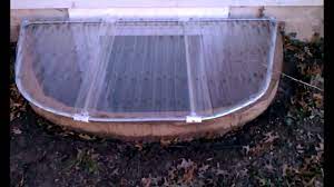 I need a basement window well cover to provide protection from both water/snow and from stray basketballs (the windows are near our basketball hoop). Diy Make Your Own Window Well Cover With Dimensions Youtube