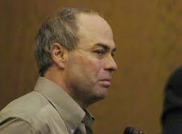 Man pleads guilty, gets life in woman's murder