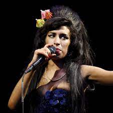 Singer amy winehouse died after drinking too much alcohol, a second inquest has confirmed. D15ejqgk 1e9jm