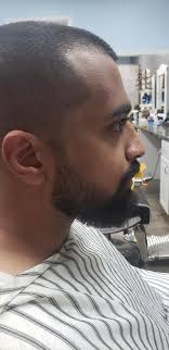 Buzz cut with full beard. Adel S Barber Facebook