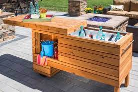 Remodelaholic Brilliant Diy Cooler Tables For The Patio With Built In Coolers Sinks And Ice Boxes Diy Outdoor Bar Backyard Projects Diy Outdoor Kitchen