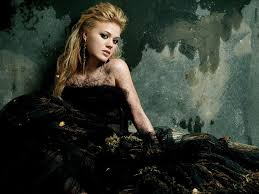 Apparently, she's in search of a place where she would feel like she truly belongs; Breakaway Lyrics Kelly Clarkson Chadeyron