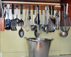 This Photo Is Part Of An Amish Woman S Kitchen In Aylmer Ontario It S A Whirl Of Whisks Spatulas Amish Kitchen Cabinets Amish House Kitchen Cabinet Makers