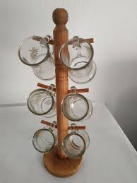 Start your day off right with a custom mug! 6 Beer Mugs On Stand Wood And Glass Catawiki