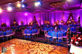 Lighting Dont Like The Tacky Pattern Going On On That Dance Floor Though Purple Wedding Decorations Wedding Reception Lighting Purple Wedding