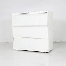 The calico design file cabinet is an office delight that has proven to be useful for the filing of important documents. White Three Drawer Side Filer Three Drawer Office Storage White Filing Cabinet
