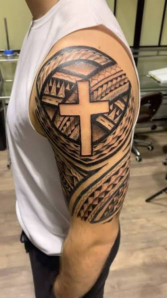 Cross on Polynesian upper arm tattoo , #polynesiantattoo,#samoantattoo,#maoritattoo,#tribaltattoo,#therock,#polytribal,#blackworkers,#blackwork,#phatbuddhatattoos,#phatbuddhaelitetattoos,#torontotatto...