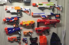 Don't forget to hang ammo vests and safety goggles! Toy Nerf Wall Cheap Toys Kids Toys