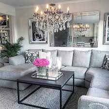 White and gray roman shades hang from windows fitted over white wainscot lower walls in an elegant living room boasting brown. 25 Swoon Worthy Glam Living Room Decor Ideas Digsdigs