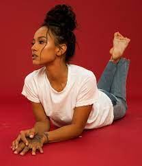 Karrueche Tran _ celebrity feet in the pose : rStomachDownFeetUp