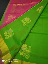 The whole concept is to maintain the elegance and royality of the saree. Green And Pink Colour Kanchi Silk Saree With Arani Pattu Border Butta Contrast Pallu Along With Blouse Designr Me