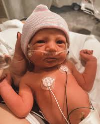 We are thrilled and exhausted to introduce Cooper Maverick Brown to you 🤍  12/10/22 5lbs 15 oz and 20 in long born at 35 weeks and 6 days. The longest  I've ever