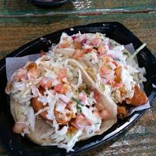 It all comes together within about an hour… the cabbage slaw adds a real nice acidic kick and crunch to the taco. Baja California Fish Tacos Fullerton