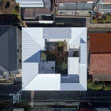 It has a total floor area of 48 sq.m. Tomohiro Hata S Loop House Turns Inwards Onto A Central Courtyard