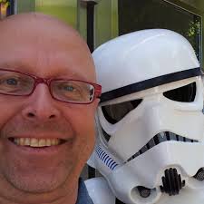 How to change paragraph style in all text frames across a document?