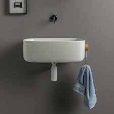 Stainless steel floor standing hand wash basin. Washbasin In Polyurethane With Laterl Towel Holder Bounce