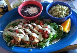 Chicken enchiladas and nachos the best on the menu. Agua Verde Cafe Great Fish Tacos In Seattle Fish Tacos Food Mexican Food Recipes