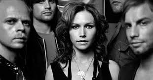 Black And White Music Video Female Singer 2000s The Cardigans Are A Swedish Rock Band Formed In Jonkoping Sweden In 1992 By Guitarist Peter Svensson Bassist Magn Early 2000s Music Music Bands 2000s Music
