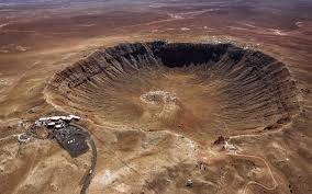 The perfectly circular meteorite impact crater is 450 meter (1476 feet) in diameter and 30 meter (100 feet) deep. Meteor Crater Meteor Crater Hiking Spots National Monuments